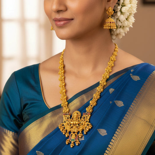 Antique Finish temple Lakshmi haram with matching earrings on a model