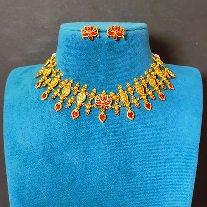 Traditional South Indian matte antique gold temple choker necklace with symmetrical red kemp stones, matching lotus earrings, and an adjustable thread dori