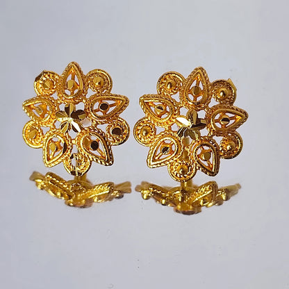 Pair of gold plated Indian Classic floral earrings on a light gray background