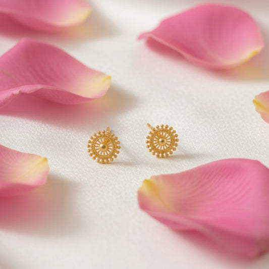 Gold plated Mandala Art earrings on pink rose petals