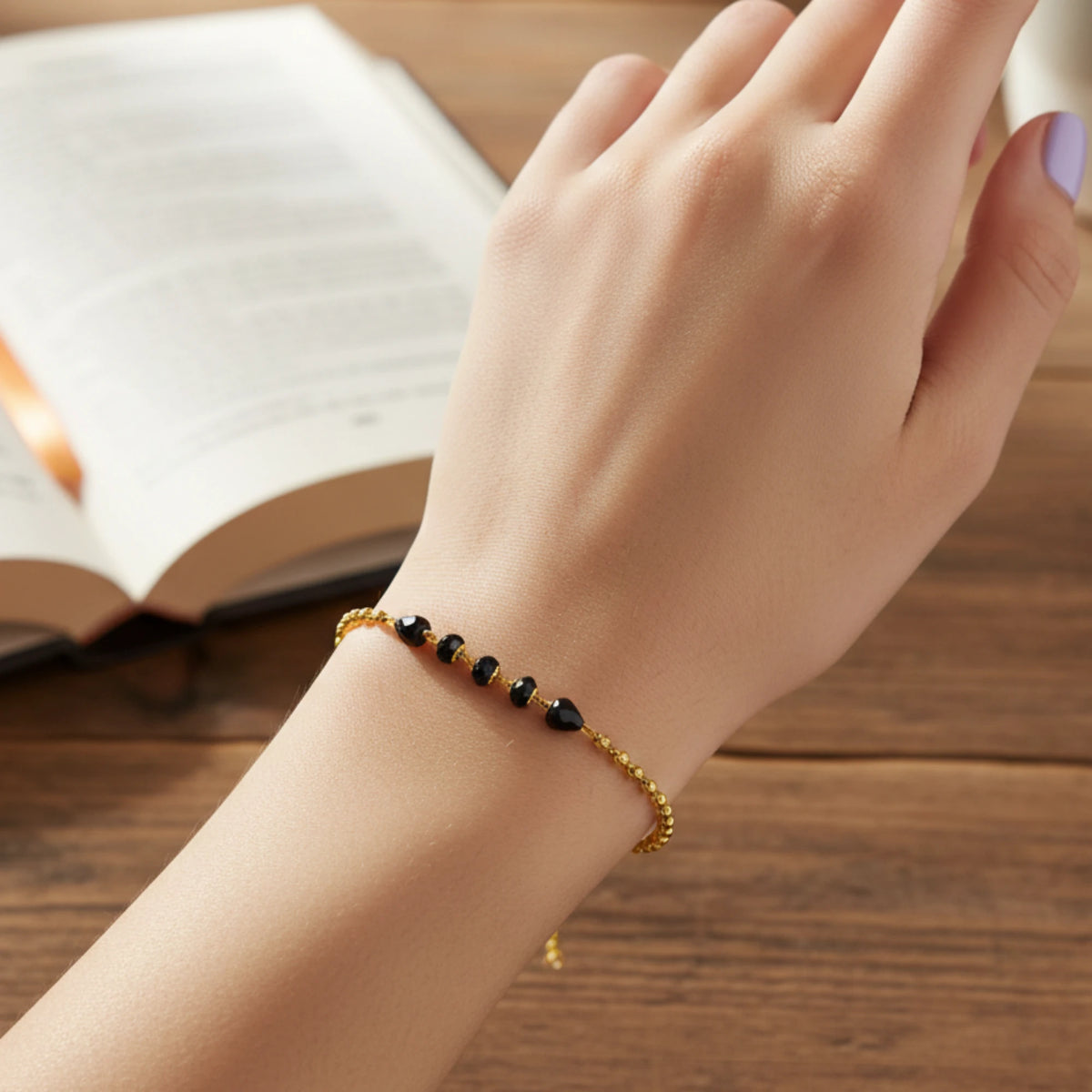 Gold Plated Traditional Gold And Black Bead Charm Bracelet 24 Carat gold-plated-traditional-gold-and-black-bead-charm-bracelet-24-carat