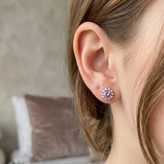Rose Gold Plated Dainty Lavender Hue Earrings in AD stones on a Model's ear