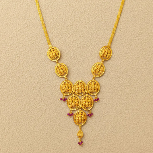 Gold plated Ayodhya Heritage Ram Parivar necklace with intricate design on a beige background